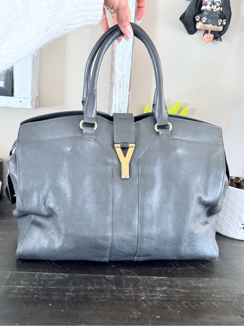 Yves Saint Laurent Black calf skinLeather Top-Handle duffel with Gold Y Hardware